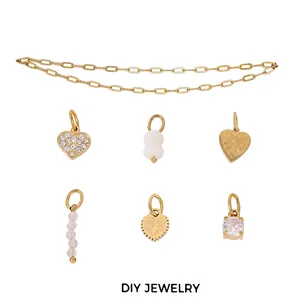Golden stainless steel chain set with heart, star, and crystal charms for DIY jewelry