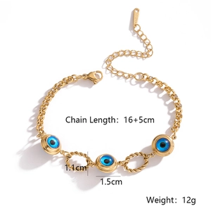 Detailed view of gold plated stainless steel bracelet with blue evil eye charms and chain