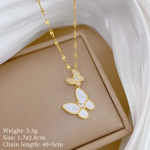 Detail of double-layer butterfly pendant with micro-inlaid diamonds and white mother of pearl