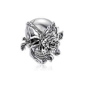 Silver skull pendant with rose floral details and antique finish on white background