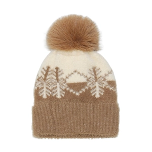 Detail of winter knit beanie with snowflake patterns and fluffy brown pom-pom