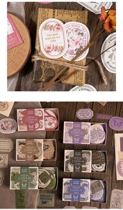 Macro shot of 40-piece vintage gold-stamped scrapbooking stickers in diverse shapes