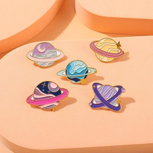 Set of five colorful planet metal enamel brooches featuring universe and stars themes