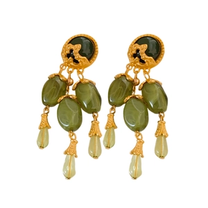 Vintage round tassel drop earrings in gold hardware with olive green stones