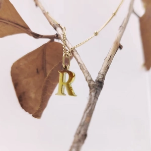 Elegant gold titanium steel necklace with letter R pendant and delicate ball chain design