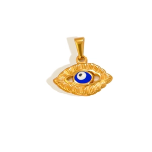 Macro shot of gold-plated evil eye pendant with blue enamel detail on white background