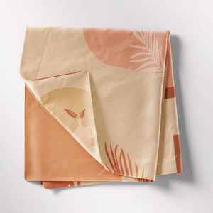 Detail of bohemian tapestry fabric texture with abstract leaf and geometric patterns
