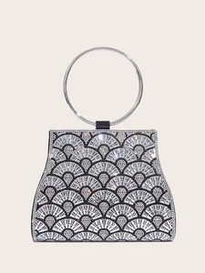 Detailed view of silver and black evening clutch with rhinestone geometric fan patterns