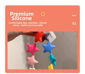 Detail showing colorful star-shaped matte silicone beads for bags or keychains
