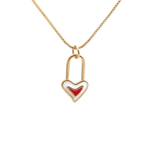 Golden heart lock necklace with evil eye design and red heart center on white background