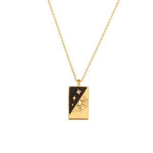 Minimalist gold tarot pendant necklace with sun and star patterns on black and gold plate