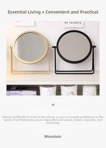Detail of round nordic iron makeup mirrors in gold and black with 360-degree rotation