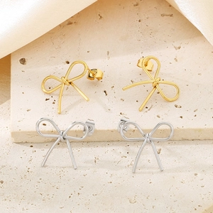 Boucles d'oreilles papillon élégantes en acier inoxydable doré et argenté