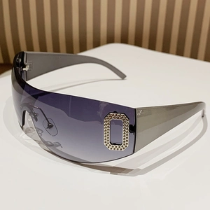 Y2K frameless rimless shield sunglasses with grey gradient lenses and silver rhinestone logo