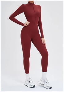 Detail view of burgundy long sleeve bodysuit with stand collar and half zipper