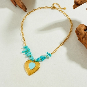 Gold chain necklace with blue stone beads and engraved heart pendant with turquoise stone