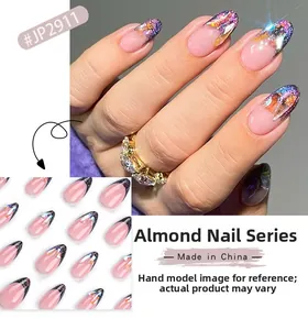 Detail of almond-shaped press-on nails with purple aurora gradient and gold glitter accents