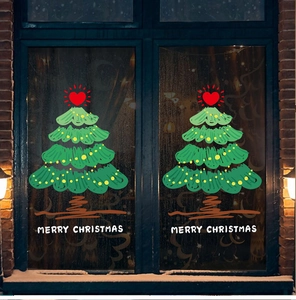 Hand-drawn green Christmas tree static window decal with Merry Christmas text on glass