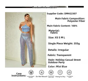 Detailed view of dusty blue sequined halter top and pants with 100% polyester fabric info