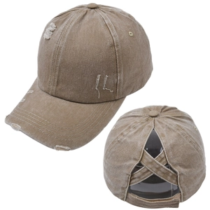 Detail of washed cotton baseball cap with criss-cross ponytail hole and distressed finish