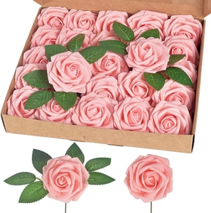 Detailed view of light pink PE foam roses with artificial leaves in a bulk gift box