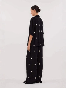 Women's 2-piece set with black and white polka dot shirt and high waist wide leg pants