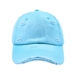 Detailed close-up of the distressed torn fabric edges on a vintage sky blue cotton cap