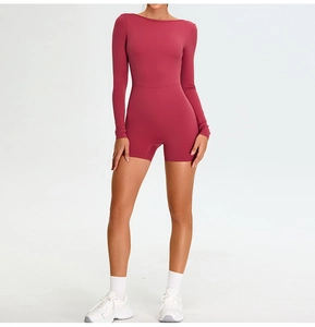 Close-up of red long sleeve yoga jumpsuit showing high-elasticity quick-dry fabric details