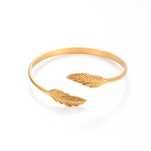 Adjustable gold stainless steel open bangle featuring detailed feather leaf motifs