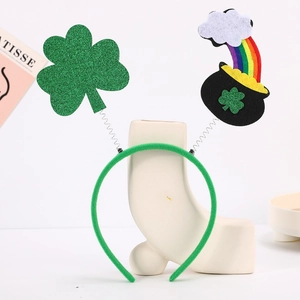 Detail of St. Patrick's Day headband with clover, rainbow and gold pot on green band