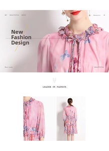 Detail of floral chiffon dress with butterfly print, ruffled collar and tie-up neck