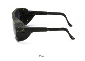 0-degree side view of safety glasses with black frame and yellow inkjet dot pattern