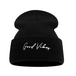 Black knit beanie with Good Vibes embroidery and fold-over cuff for winter street style