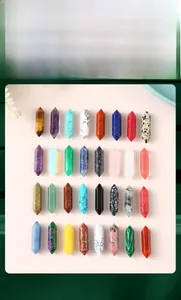 Array of hexagonal double-pointed natural crystal prisms in various gemstone textures