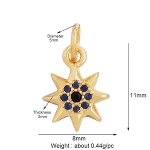 Macro view of gold-plated star charm with blue crystals and measurement specs