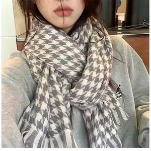 Classic houndstooth scarf in grey and white with fringe tassels for winter warmth