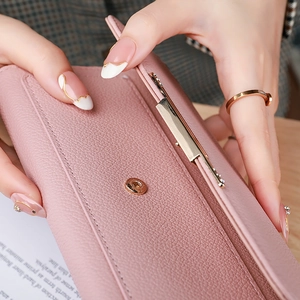 Pink lychee texture leather tri-fold wallet for women with golden metal buckle clasp