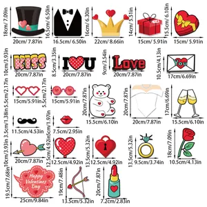 Detailed size chart for 23 Valentine's Day photo booth props including hats and hearts