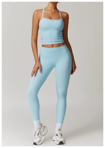 Detail of light blue sky yoga set featuring slim straps tank top and high waist leggings