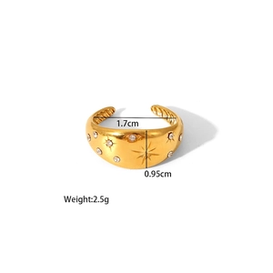 Detailed view of adjustable gold-plated steel ring with star engraving and cubic zirconia