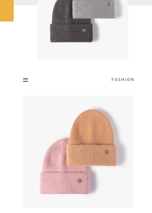 Close-up of winter knit beanies in grey pink and beige with metal logo details