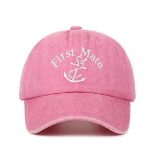 Detailed embroidery of First Mate text and anchor on pink washed cotton baseball cap