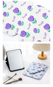 Detail of white PU leather folding makeup mirrors with purple tulip print in two sizes