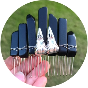 Handcrafted gothic hair comb with black raw crystals and silver metal raven skulls