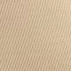 Gros plan sur la texture du velours côtelé beige avec motif à fines côtes