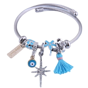 Adjustable stainless steel beaded bracelet with blue evil eye and handmade charm