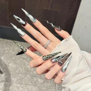 Silver-black punk stiletto press-on nails with 3D snake design and demon eye art