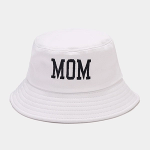Close-up of black MOM embroidery on white canvas bucket hat with high-quality texture