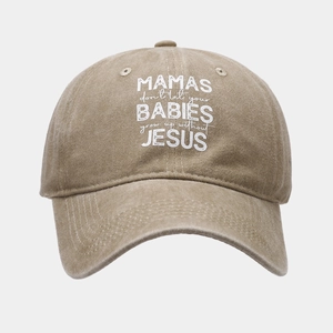 Detailed close-up of washed cotton cap with vintage Jesus slogan embroidery