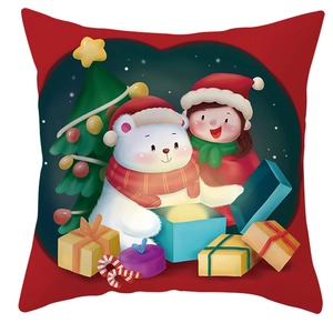 Detailed view of Santa pillow cover with cute girl and white bear opening a glowing gift
